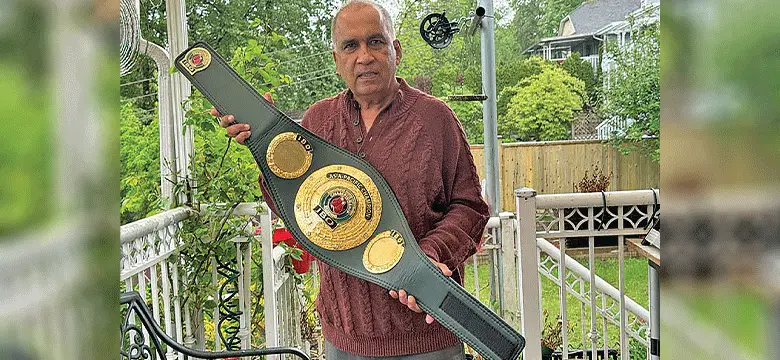 South Pacific Boxing promotions director Mohammed Shammem with the International Boxing Organisation (IBO) Super Welterweight Asia Pacific title in Canada.