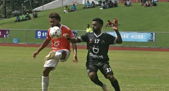 Rewa’s Misaele Draunibaka beats JUnior Narend Rao of Ba during the round six of the Digicel Premier League match at the Churchill Park, Lautoka. Photo: WAISEA NASOKIA. 