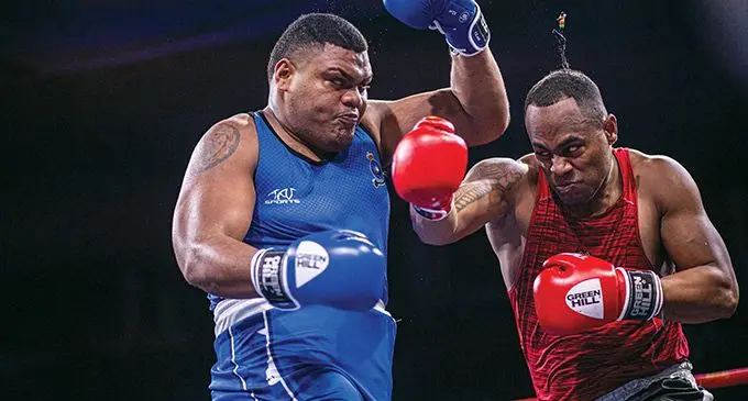 Amateur heavyweight boxer Semi Dauloloma (right) on attack against Victor Rova at the National Gymnasium in Suva on September 24, 2022. Dauloloma turns pro on December 17, 2022. Photo: Leon Lord