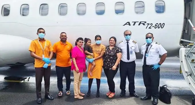 The Nand family of Lautoka with the Fiji Link cabin crew.