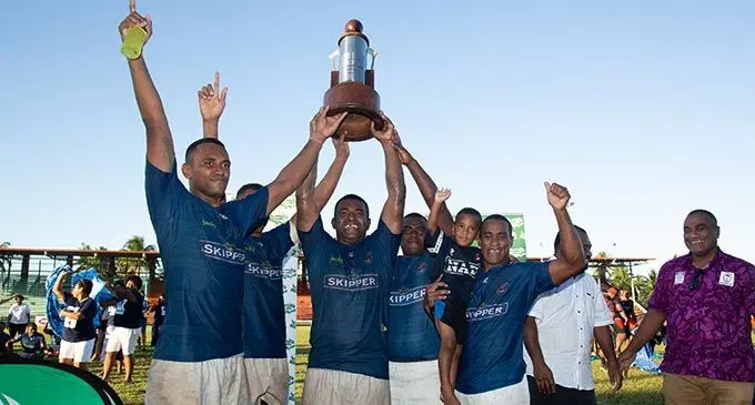 Jack’s Nadi players lift the INKK Fiji Rugby Farebrother Trophy at Ratu Cakobau Park, Nausori, this afternoon. Photo: Leon Lord