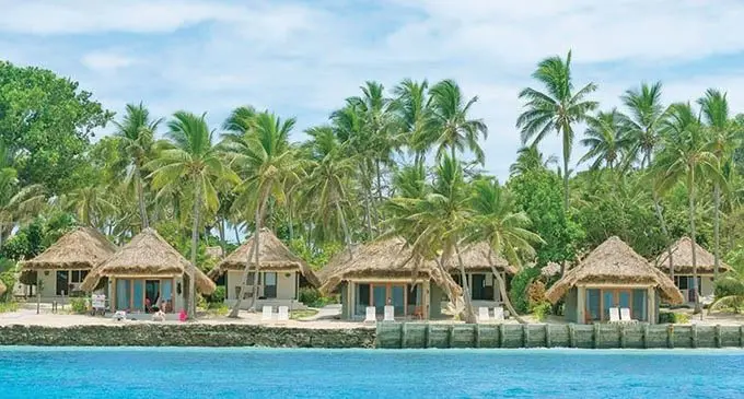 Beachfront bures at Castaway Island Resort.