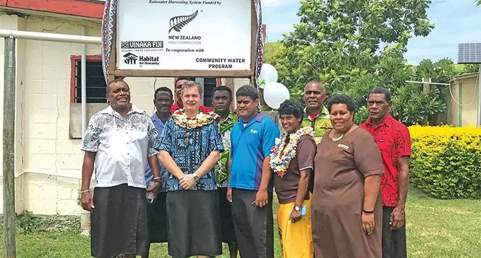 New Zealand High Commissioner Jonathan Curr with Yanuya villagers.
