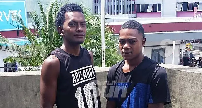 Nakodu village youths Aminiasi Boleinakodu (left) and Kalivati Bale in Suva yesterday. Photo: Laisa Lui