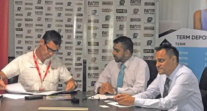 From left: Haed of Sky Pacific Mike Greig, Acting CEO FBC Vimlesh Sagar and FBC TV Manager Vinal Raj.   Photo: Grace Narayan