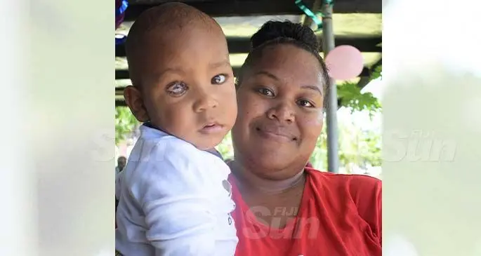 Keresi Mathew, 26, with her nine-month-old son Robert Mathew, an eye cancer survivor at WOWS Kids Suva office on March 20, 2021. Photo: Ronald Kumar