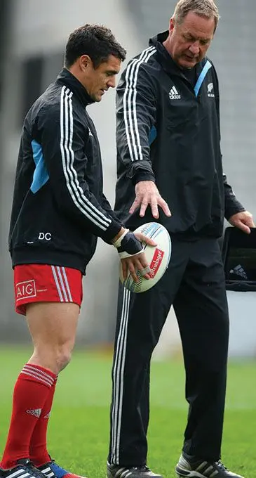 Mick Byrne (right) coaching Dan Carter during their rugby days with the All Blacks in 2013.