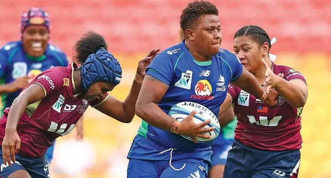 Rooster Chicken Fijiana hooker Vika Matarugu on the attack against Queensland Reds during the 2022 SuperW series in Australia.