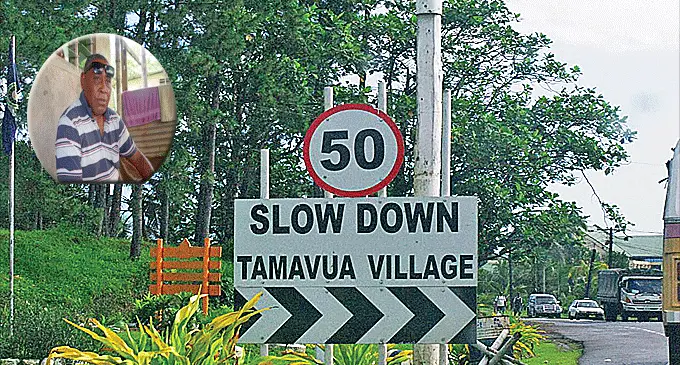 The Slow Down road sign at Tamavua Village