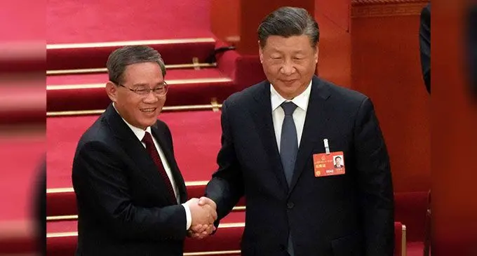 Newly elected Premier Li Qiang (left) with Chinese President Xi Jinping during a session of China’s National People’s Congress (NPC) in Beijing last Saturday. Photo: Chron