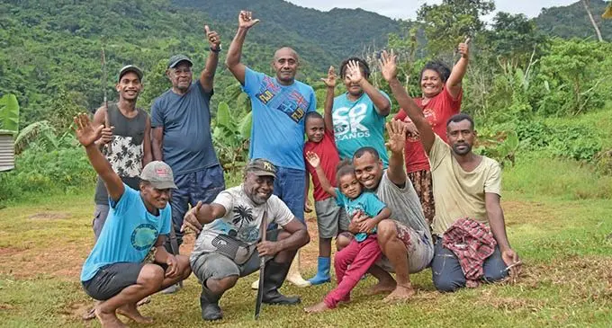 Standing third from left, Jone Veitarogi with children and farmers at Balawaviriki farm in Vaturova. Photo: Selita Bolanavanua     