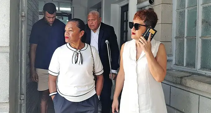Ellen Whippy (front, left), Daniel Whippy (with crutches) and Daniel Whippy’s wife (far right) outside the Suva Magistrate’s court on October 28, 2024. Photo: Beranadeta Nagatalevu