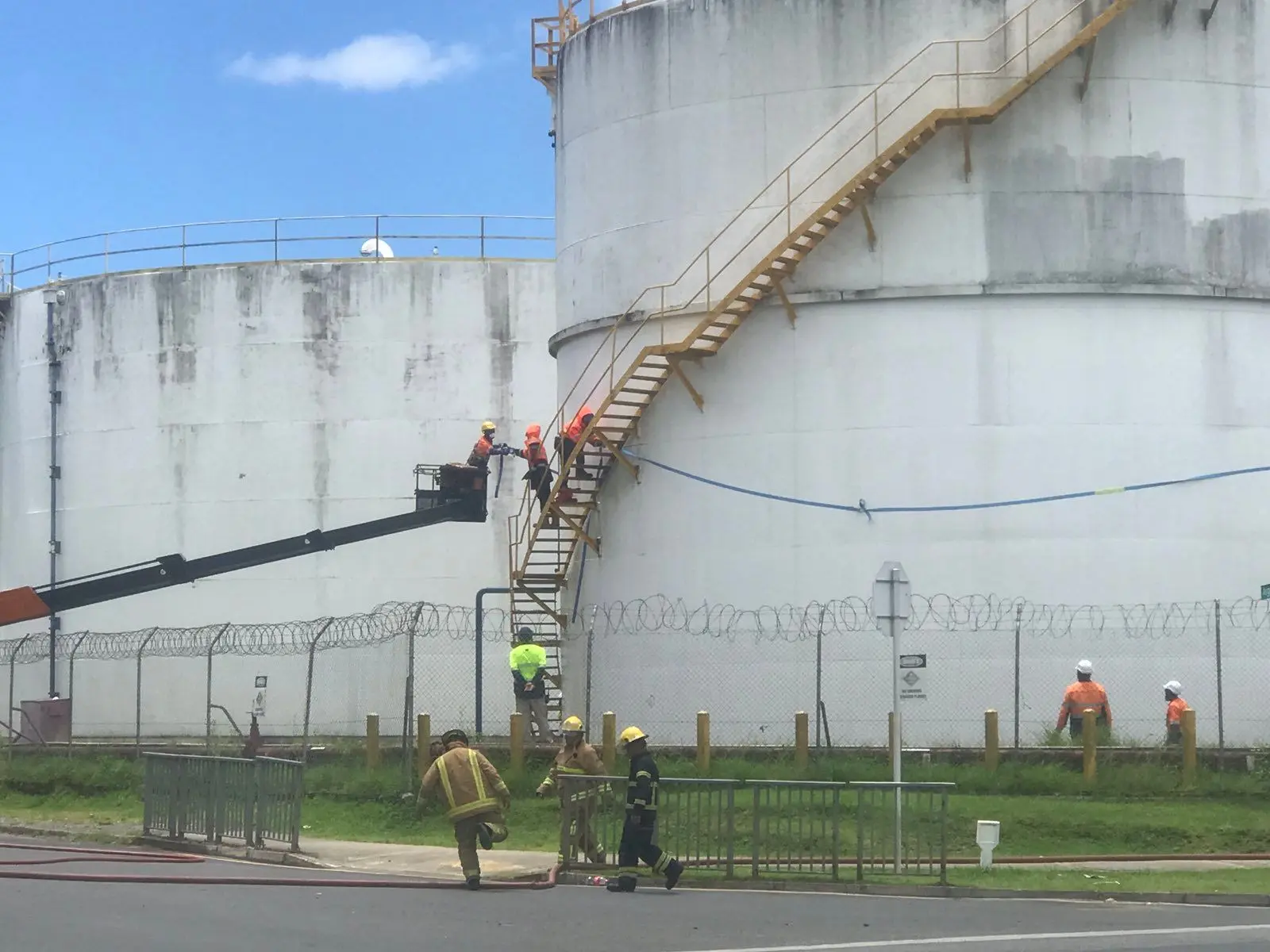 Technical experts on the job working to contain the spill and prevent any risk of fire or explosion. 