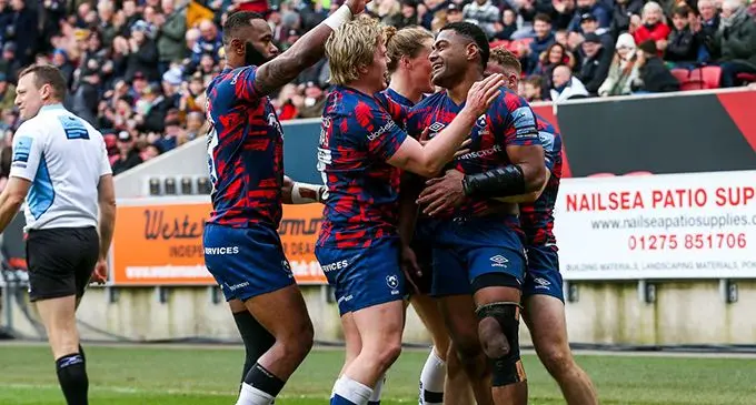 Siva Naulago (right) is congratulated by Semi Radradra (left) and Bristol team-mates after he scored a try against Newcastle during their clash on February 6, 2022.  Photo: Bristol Bears 