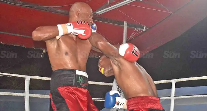 Siliveni Nawai connects to Abhay Chand during their title fight. Photo: Waisea Nasokia