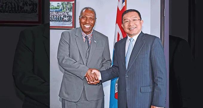 Attorney-General Siromi Turaga with the Ambassador of China to Fiji Zhou Jian. Photo: DEPTFO