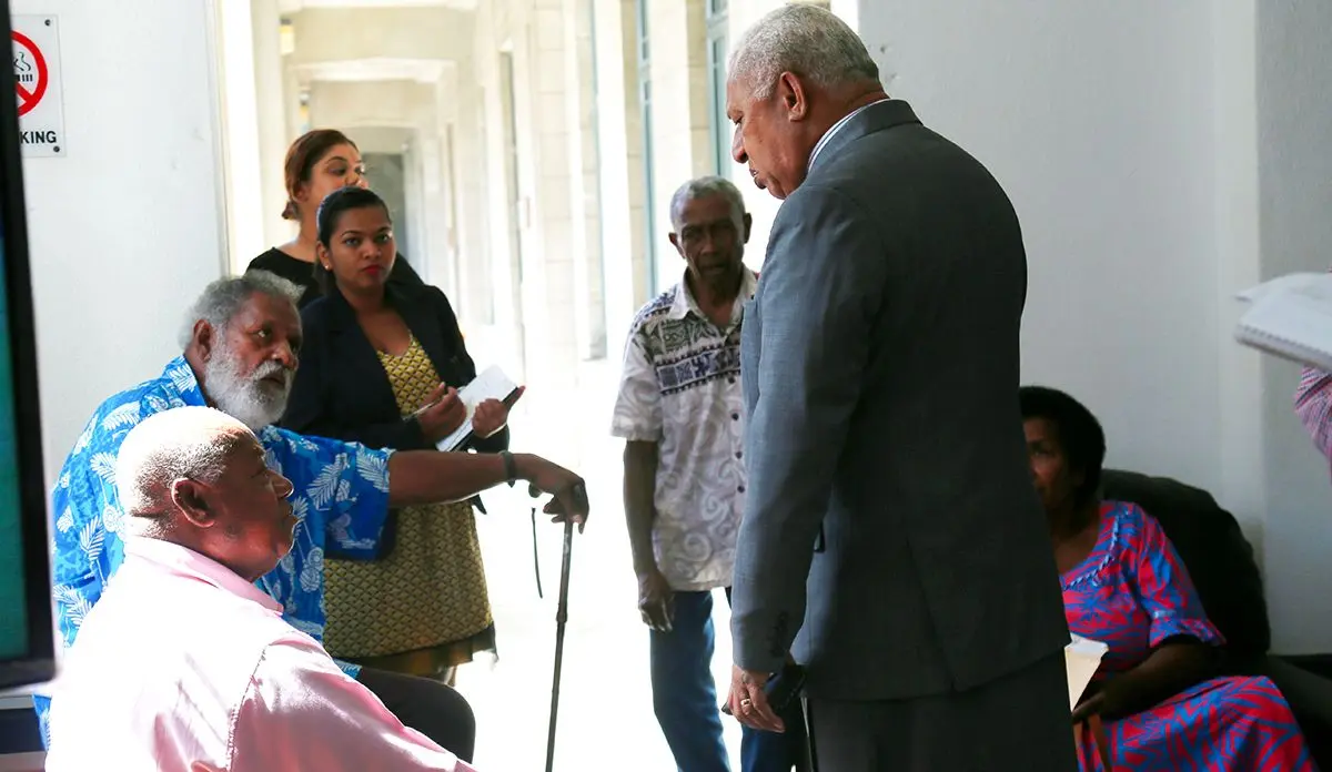 Prime Minister Voreqe Bainimarama with members of the public outside of Parliament on July 28, 2020. Photo: Kelera Sovasiga