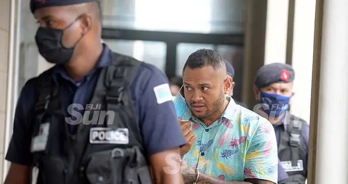 Jone Vakarisi (bula shirt) outside the Magistrates Court in Suva on October 6, 2021. Photo: Ronald Kumar