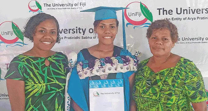 Weka Ratudale(center) with her sister Karalaini Sanoko and mother Lusiana Ratudale after the University of Fiji graduation at the Saweni, Lautoka Campus on April 28, 2023. Photo: Salote Qalubau