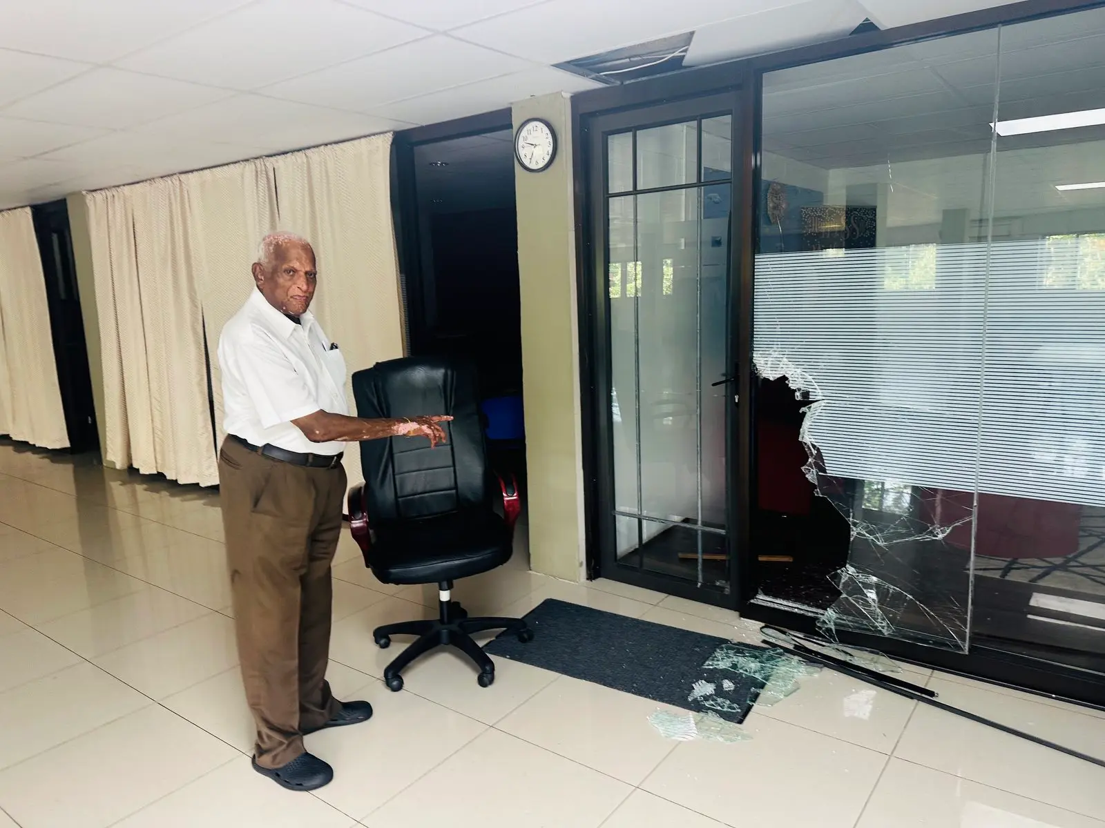 Kinoya Assembly of God Church Senior Pastor Philip Madhavan shows the damage to his office at the church in Kinoya, Nasinu.