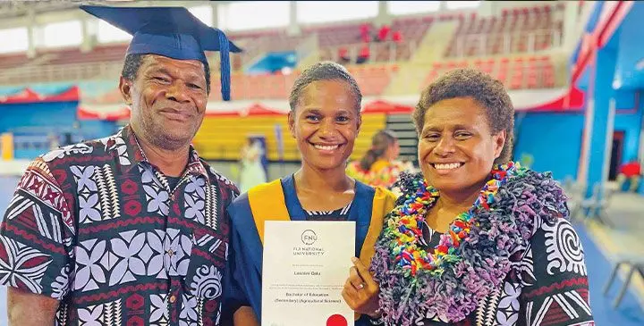 Losalini Qalu, with her proud parents. Photo: Ronald Kumar