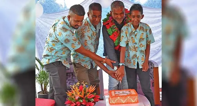 Manos Motors Vehicle Inspection Agency owner Manoj Kamal (second from left),Minister for Commerce , Trade, Tourism, Transport Faiyaz Koya, cut the cake to mark the official opening of the business along the King’s Highway in Nakasi on November 23,2022. Photo: MCTTT