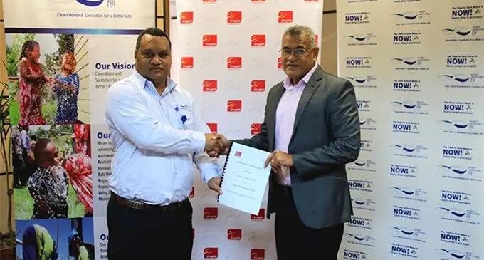 WAF General Manager Customer Services and Acting General Manager Operations, Mr Sekove Uluinayau and FNPF Chief Executive Officer Mr Jaoji Koroi following the signing of the MOU today.