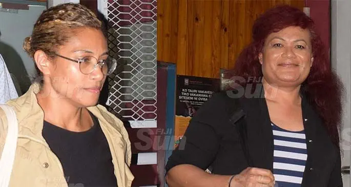 Opposition Member of Parliament Lynda Tabuya and Dr Isireli Biumaitotoya being escorted to the Totogo Police Station from the CID HQ in Suva on March 26, 2020. Photo: Ronald Kumar