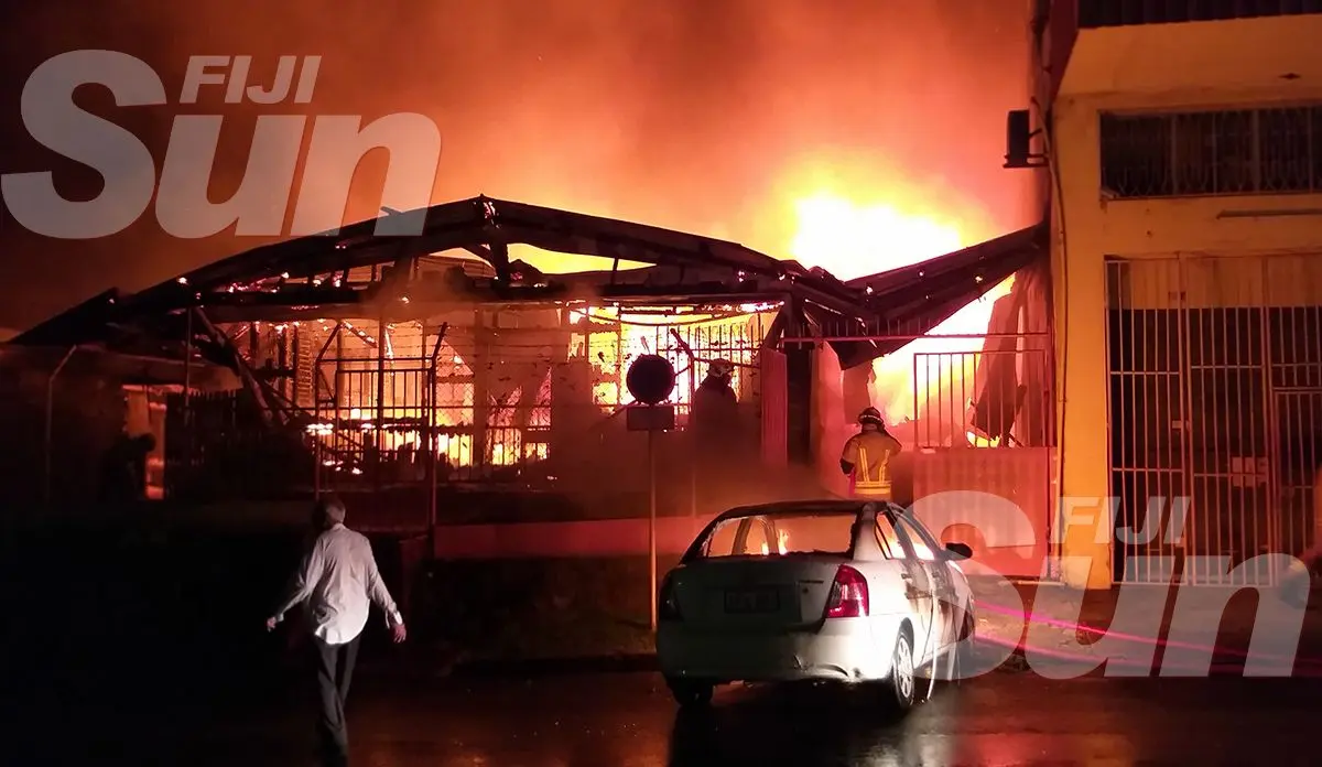 A wooden building in Spring Street at Toorak, Suva, was engulfed in fire last night and later spread to the adjacent concrete building. Police and fire officers, as well as personnel from Energy Fiji Ltd were at the scene. A rescue team from the National Fire Authority was seen inside the building. A car was also set alight as a result of the fire. When this edition went to press firefighters were still trying to contain the blaze. Words: Ivamere Nataro.  Photos: Shohail Khan and Rosi Doviverata. 