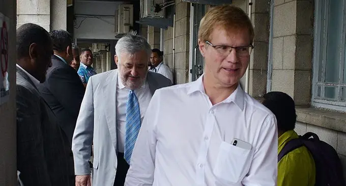 Seventh-day Adventist Church lawyers Andrew Tokley QC (front) followed by David Bennett QC outside court on February 14, 2020.  Photo: Ronald Kumar
