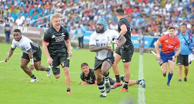Lepani Botia of Fiji Airways Flying Fijian against Maori All Blacks defense during test match at ANZ Stadium. Photo: Ronald Kumar.
