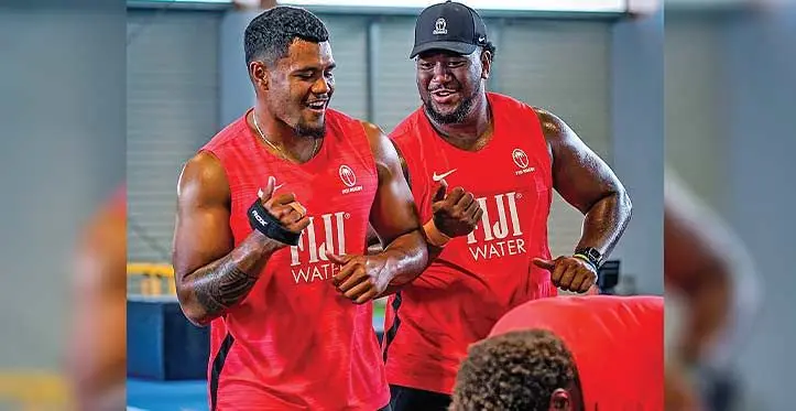 Zuriel Togiatama, left and Eroni Mawi in a jovial mood while Tevita Ikanivere does his weights while they train in France on October 4, 2023. Photo: FRU Media