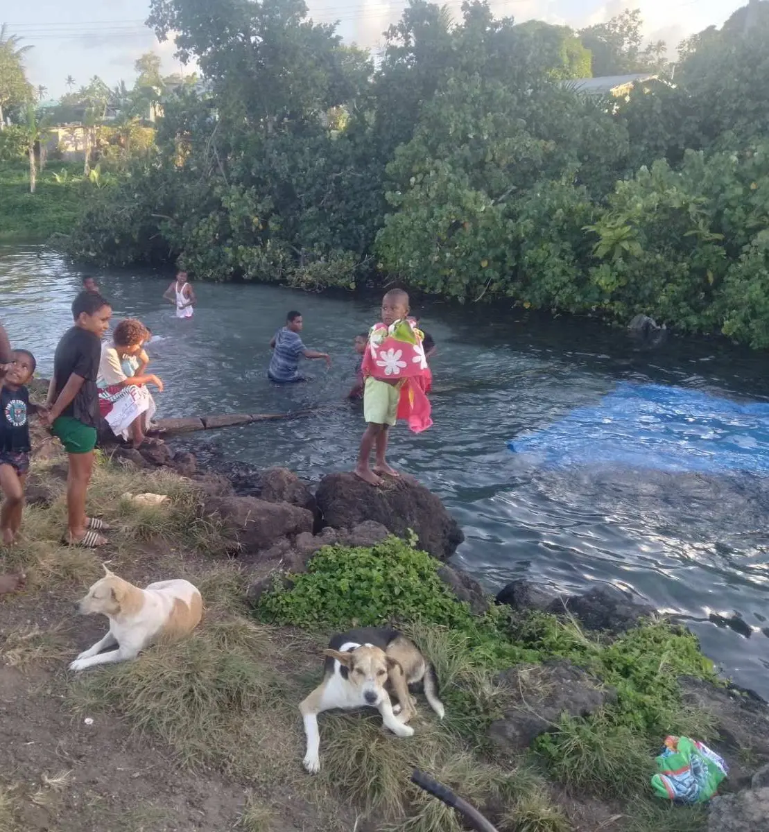 People on Taveuni Island gathered at a river to have bath on October 14, 2025. 