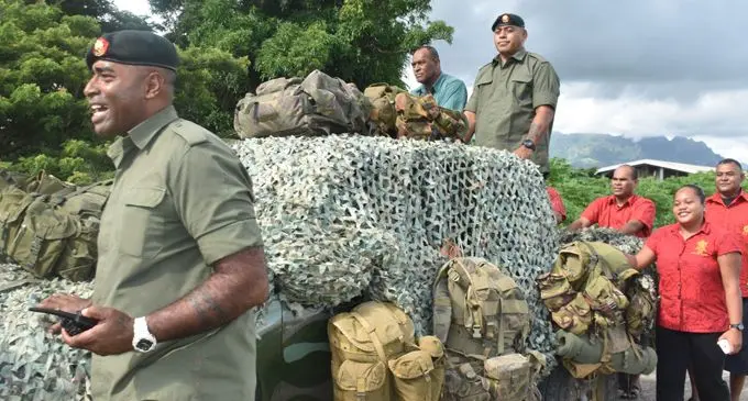 Republic of the Fiji Military Forces soldiers Class 1 Simione Rarasea and Sergeant Lepani Matevakaloloma being accorded the military farewell for retiring army personnel at Black Rock in Nadi on February 22, 2018. Photo: Arieta Vakasukawaqa
