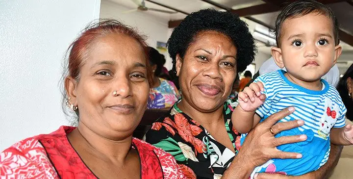 Public Rental Board Narere Estate residents Mariam Grace and Amalaini Savou with her grandchild Nancy Adi after receiving their offer letter on May 16, 2025. Photo: Ronald Kumar