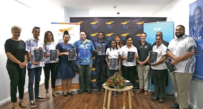 New Zealand Skills Consulting Group Certificate in Contact Centre graduates with their certificates
