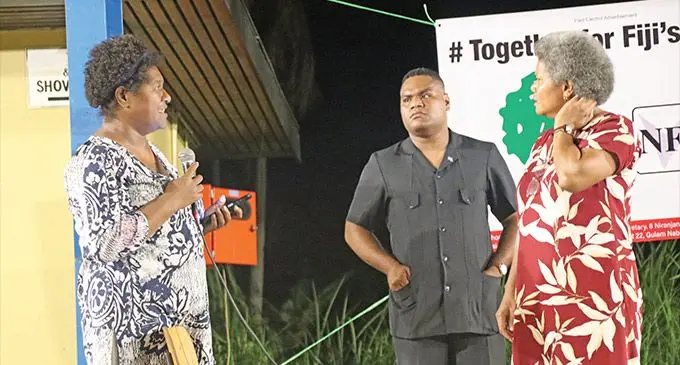 Asking the hard questions...Former journalism, Ema Mua, with National Federation Party candidates Apenisa Vatuniveivuke and enora Qereqeretabua during the NFP rally in Raiwaqa on November 17, 2022. Photo: Wati Talebula-Nuku
