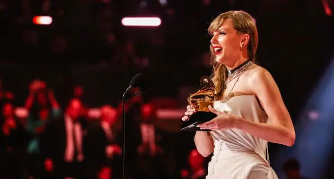 Taylor Swift accepts the Album of the Year award for "Midnights" during the 66th GRAMMY Awards on Feb. 4, 2024 in Los Angeles, California.  JOHN SHEARER/GETTY IMAGES FOR THE RECORDING ACADEMY