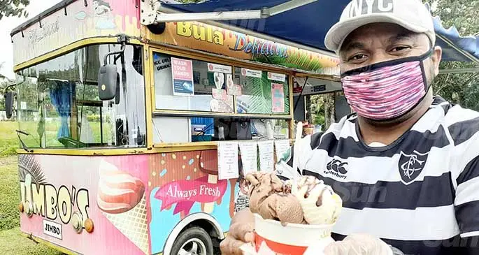 Apete Vereivalu 36, of Jimbo’s Ice Cream cart with the cart special three scoop in a tub at Pacific Harbour on June 27, 2021. Photo: Ronald Kumar