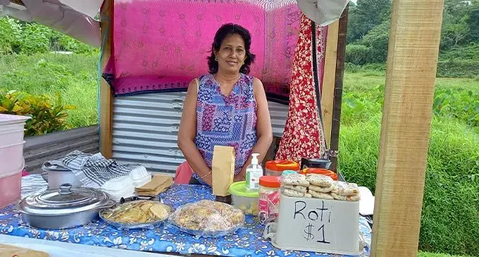 Francis Sanita Devi selling snacks along Wailekutu Road. Photo: Jone Salusalu