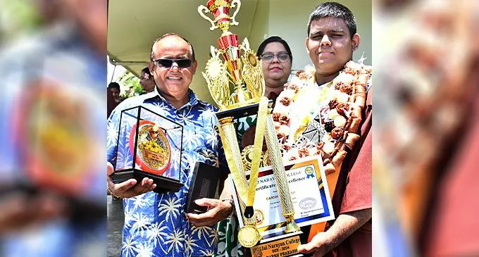 Jai Narayan College dux Darsh Prakash (right), with proud family members in Suva on December 4, 2024. Photo: Ronald Kumar