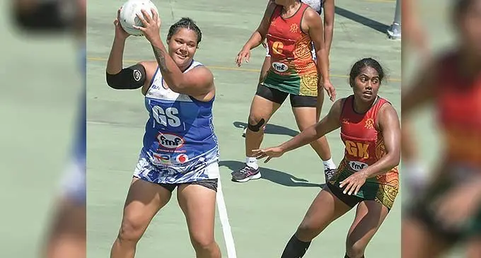 Fiji Police Force Goal Shooter Lydia Panapasa (with ball) tries to maintain possession against Republic of Fiji Military Forces Goal Keeper Kalesi Tawake during their FMF Ratu Sukuna Bowl netball match at the National Netball Centre on November 24, 2022 . Photo: Ronald Kumar