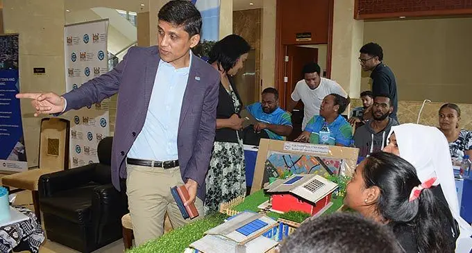 Ministry of Commerce Trade Tourism and Transport Permanent Secretary Shaheen Ali inspects Fiji National University students’ display models during World Town Planning Day at Civic Centre on November 8, 2022. Photo: Ronald Kumar