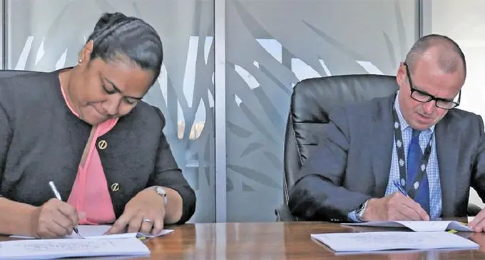 Ministry of Economy Permanent Secretary, Makereta Konrote and High Commissioner of Australia to Fiji John Feakes during the signing of the agreement on April 5, 2019.