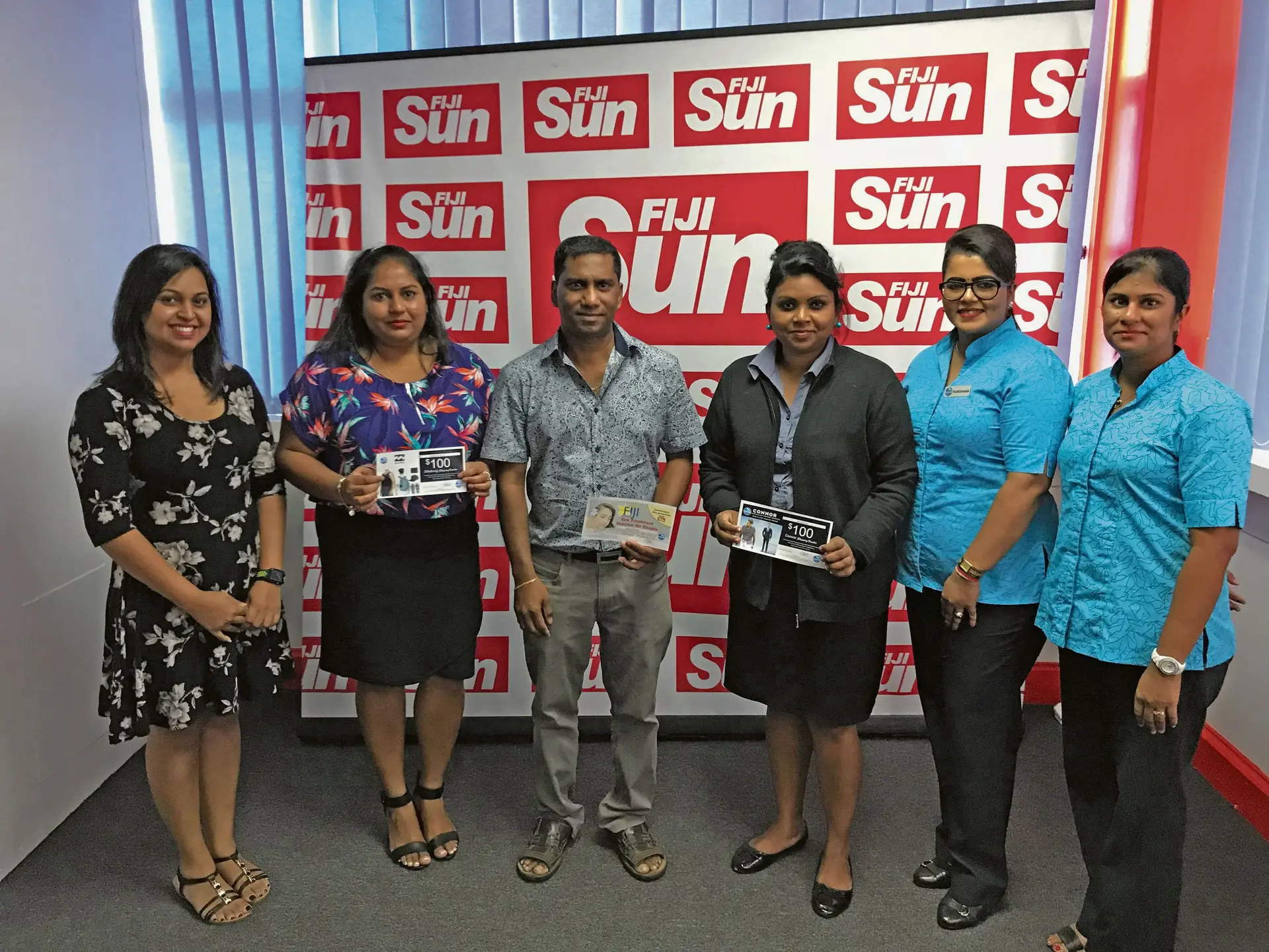 Valentines Promo winners Second from left Bandhana Vikashni Sharma, Rajnesh Ravindra and Shradha Dutt at the Fiji Sun head office during the handover of the vouchers on March 1st 2018. Photo: Roneel Karthik