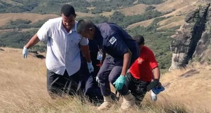 Police carry the fifth body found in the Nausori Highlands on Monday August 26, 2019.