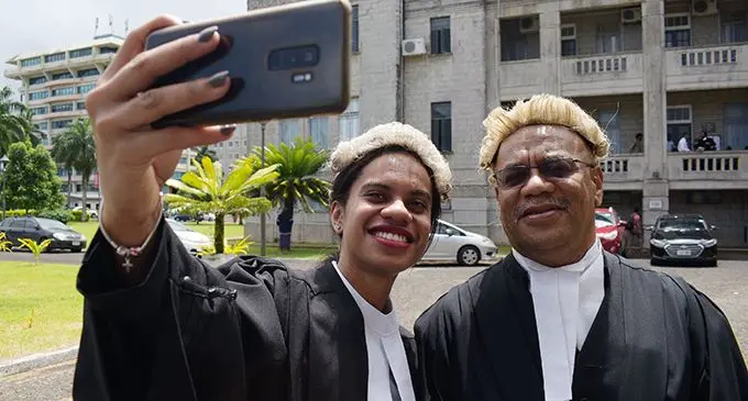 From left: Miriam Naco and father Lawyer Akuila Naco following her admission to the bar by Acting Chief Justice Kamal Kumar on September 20, 2019. Photo: Ronald Kumar
