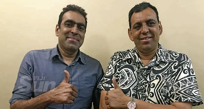 Brothers Irish and Bobby Khan give the thumbs up to the different development projects they are undertaking.  Photo: Charles Chambers