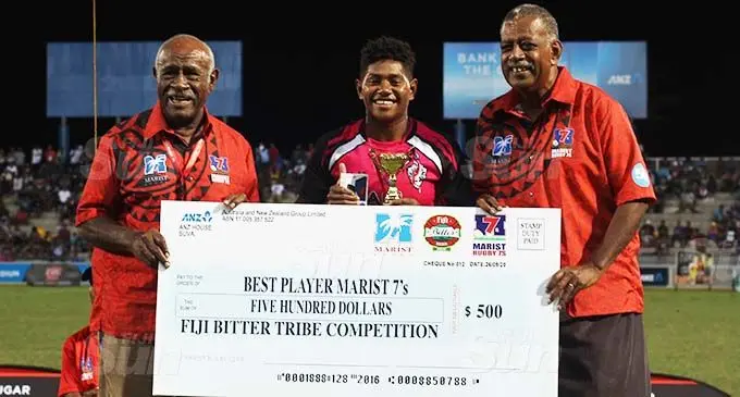 Ana Naimasi (centre) of Striders receives the best player award during the 44th Fiji Bitter Marist 7s at ANZ Stadium, Suva, on September 26, 2020. Photo: Kelera Sovasiga