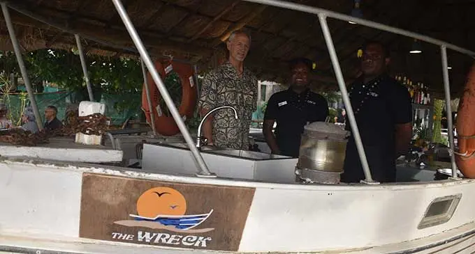 Aquarius on the Beach Managing director Dale Hermanson with staff members during the launch of the new attraction on Wailoaloa Beach, The Wreck-a boat bar. Photo: Waisea Nasokia